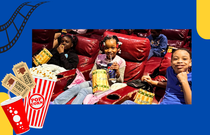  Students eating popcorn in movie theater